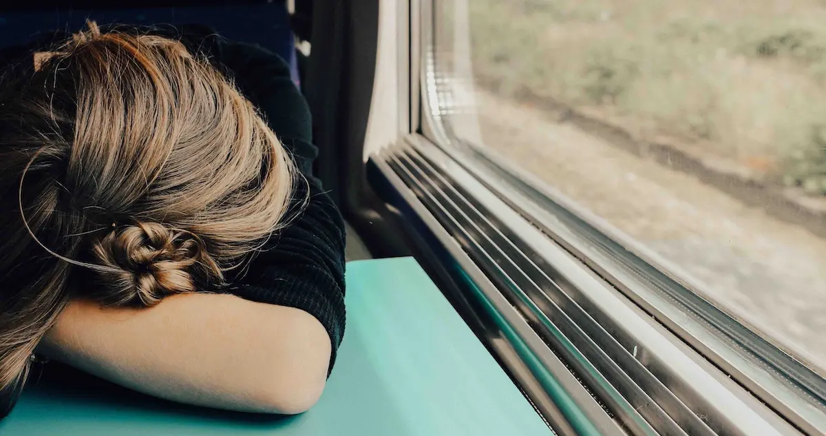 Burnout: oman lying on her forearms