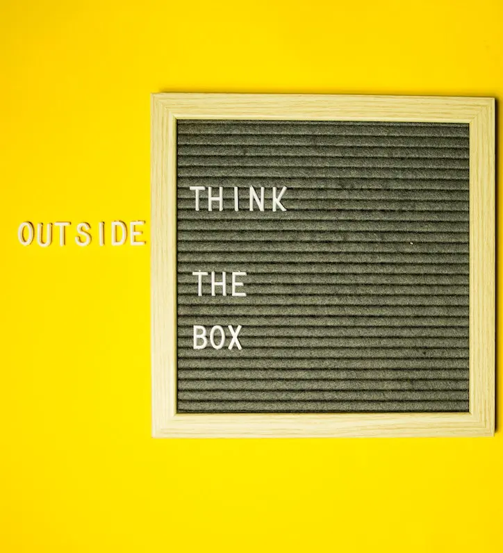 creative thinking: letters on a board saying 'think outside the box