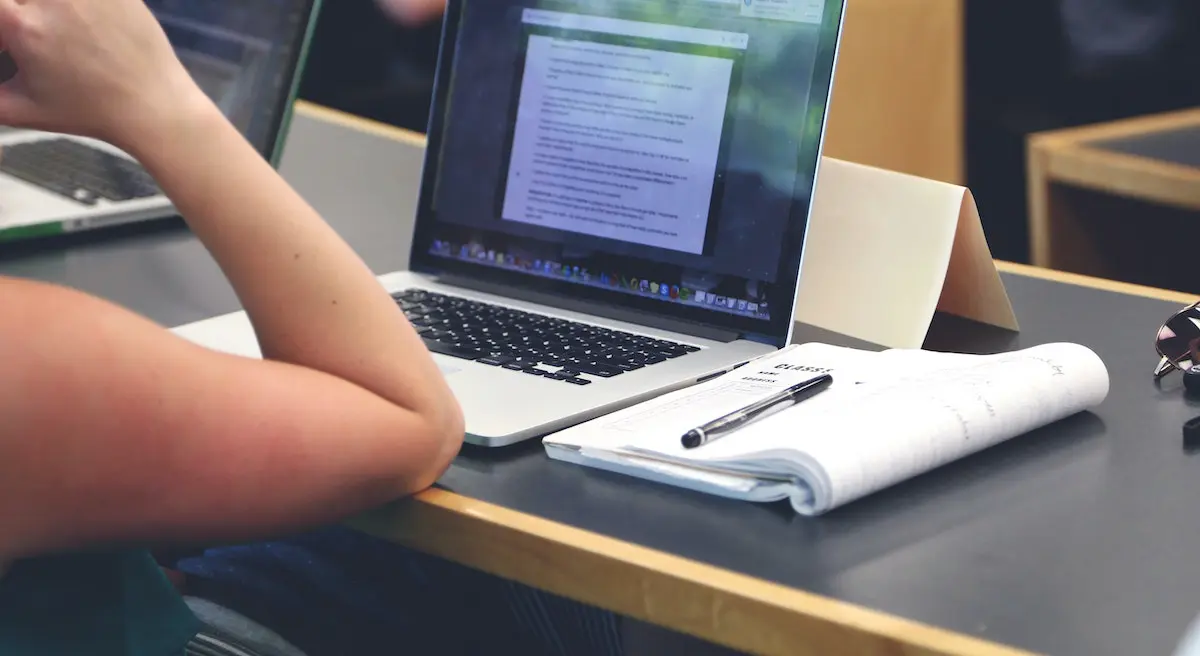 Promote your business: image of a man sitting in front of his computer