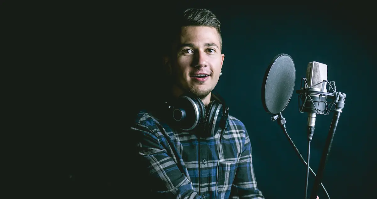 voice actor in front of microphone