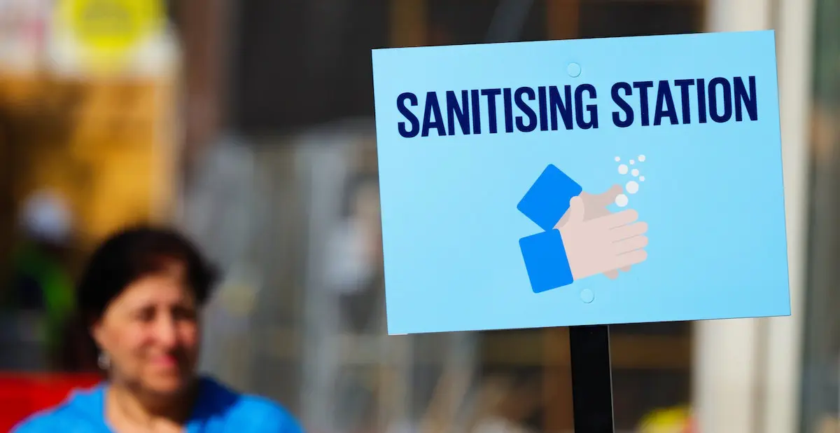Keep yourself safe: image of signboard indicating a sanitizing station