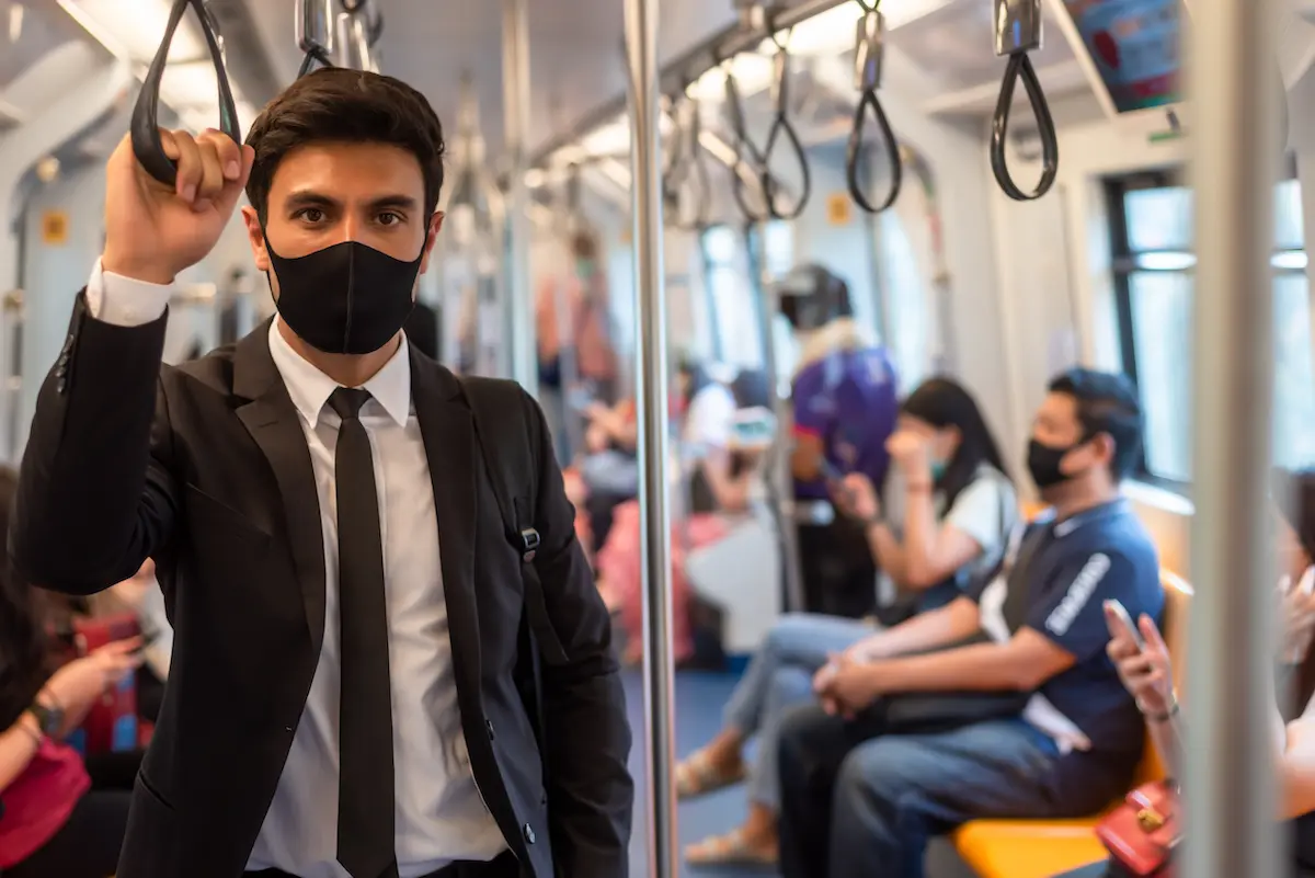 7 great things 2020 has taught us: image of man on subway wearing mask