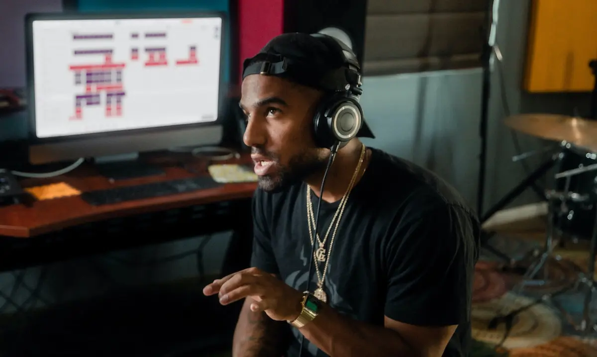 The right voice over: image of a producer directing a voice actor