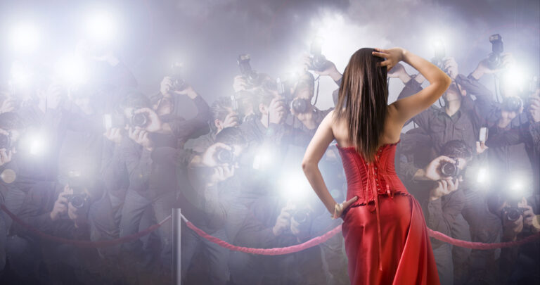 celebrity voice over: image of a celebrity in front of photographers