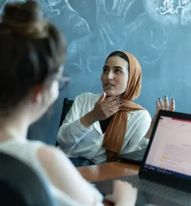 Emotional marketing value: two woman in conversation