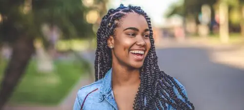 Customer retention tips: image of young woman smiling