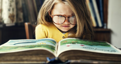 Great storyteller: image of girl reading book
