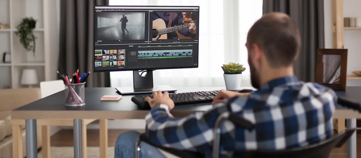 Marketing your business: image of a man editing a video
