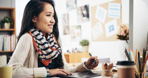 outsource: image of graphic designer at work
