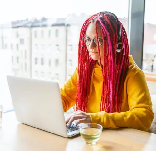 Outsource: image of graphic designer working