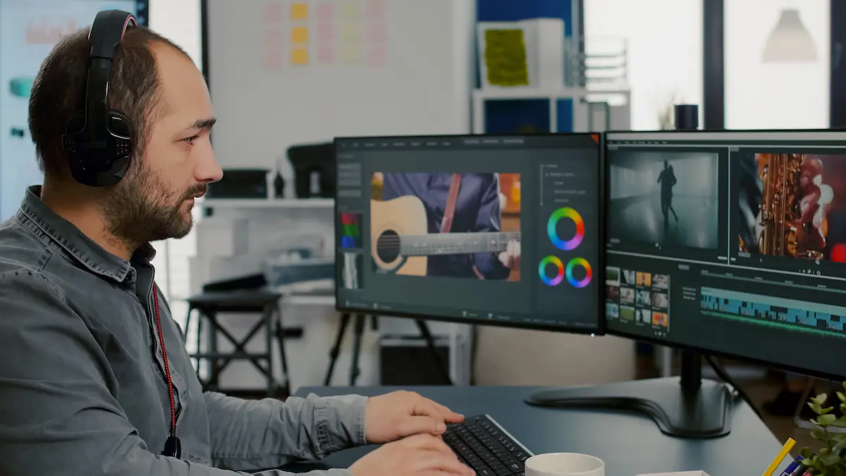 Outsource: image of videographer working