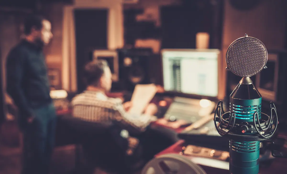 custom auditions: image of a sound engineer and a producer in a recording studio