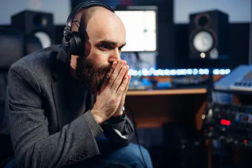 Best voice actor: image of a producer listening to a voice over recording