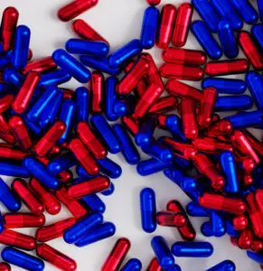 Marketing trends: image of a heap of red and blue capsules