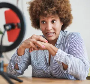 Video marketing: image of a woman streaming a live video