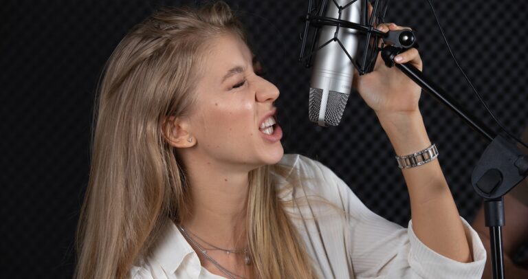 Vocal fry: a voice actor using the technique in front of a microphone.